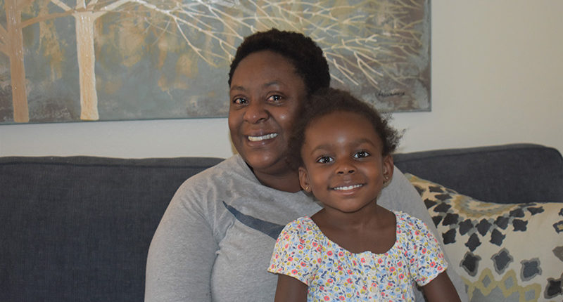Petty Officer Lindsay Armani and her daughter Chloe in their newly furnished home